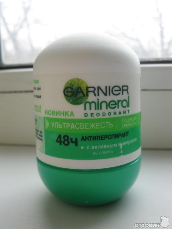 Шариковый дезодорант Garnier Mineral deodorant 48 часов защиты с активными минералами фото