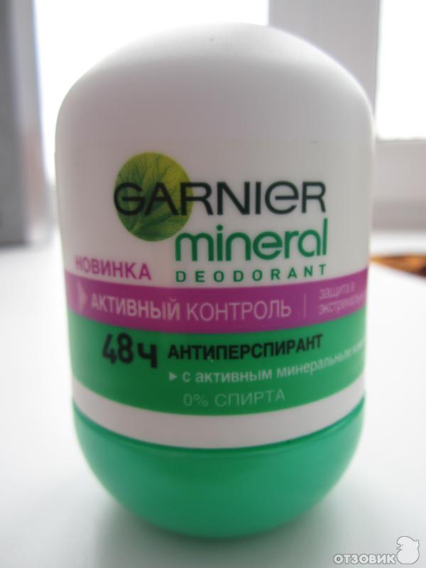 Шариковый дезодорант Garnier Mineral deodorant 48 часов защиты с активными минералами фото